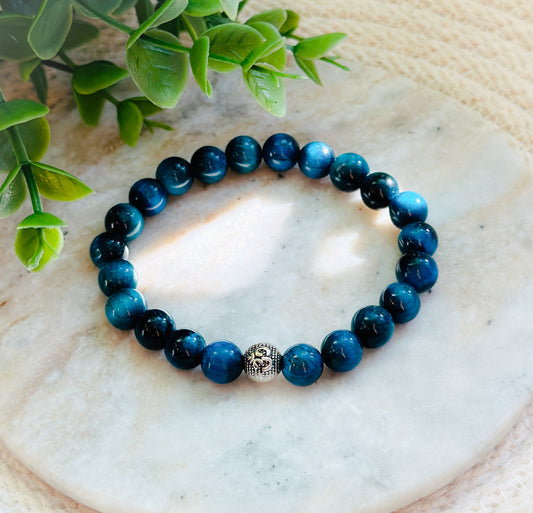 gemstone bracelet crafted with the enchanting Blue Tiger's Eye and a sacred OM bead