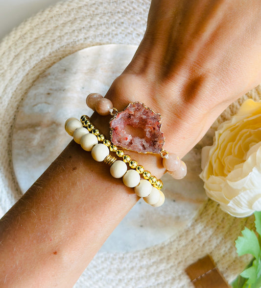 gemstone bracelet created with Sunstone Beads and a Peach Druzy Agate connector