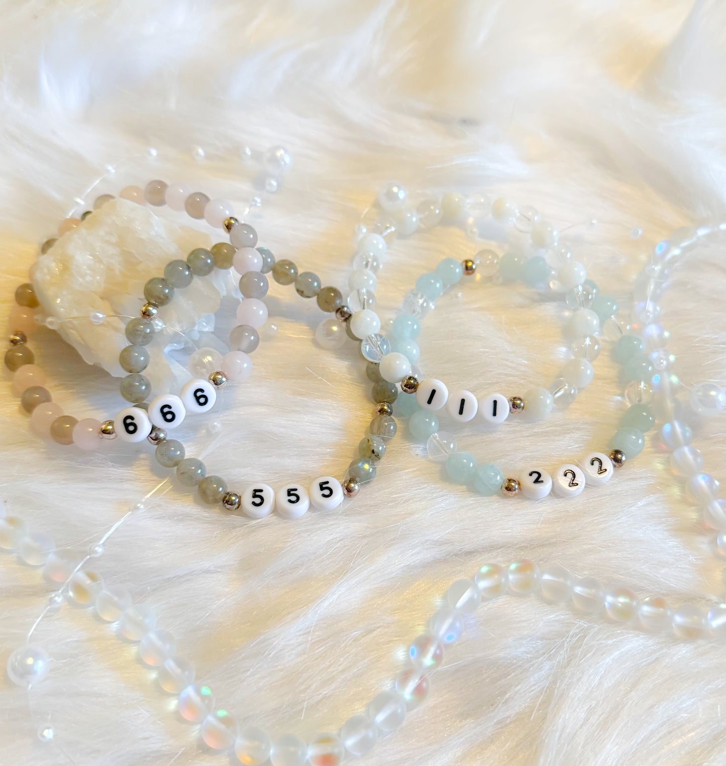 A collection of Angel Number Healing Bracelets, designed to symbolize spiritual guidance and reassurance. Each bracelet represents a unique angel number, offering messages of alignment, protection, and divine support.