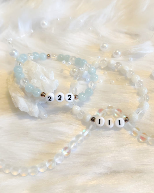 A collection of Angel Number Healing Bracelets, designed to symbolize spiritual guidance and reassurance. Each bracelet represents a unique angel number, offering messages of alignment, protection, and divine support.