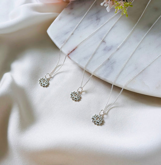 sterling silver necklace with a sterling silver lotus charm