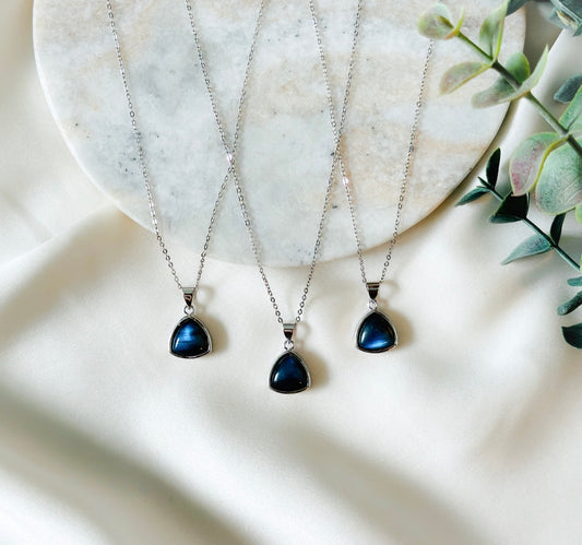 sterling silver necklace adorned with a captivating Labradorite charm.