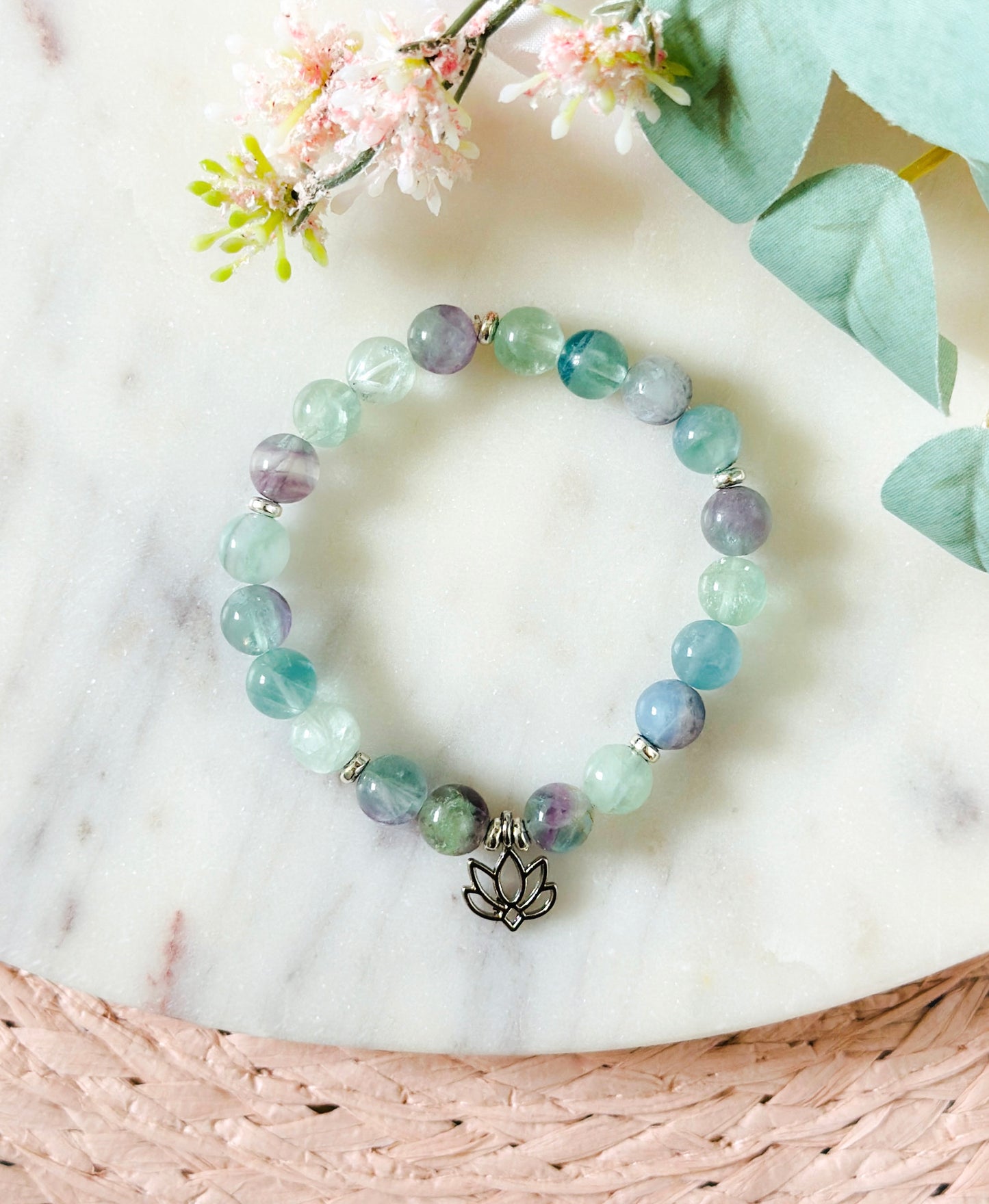Fluorite gemstone bracelet with a lotus charm