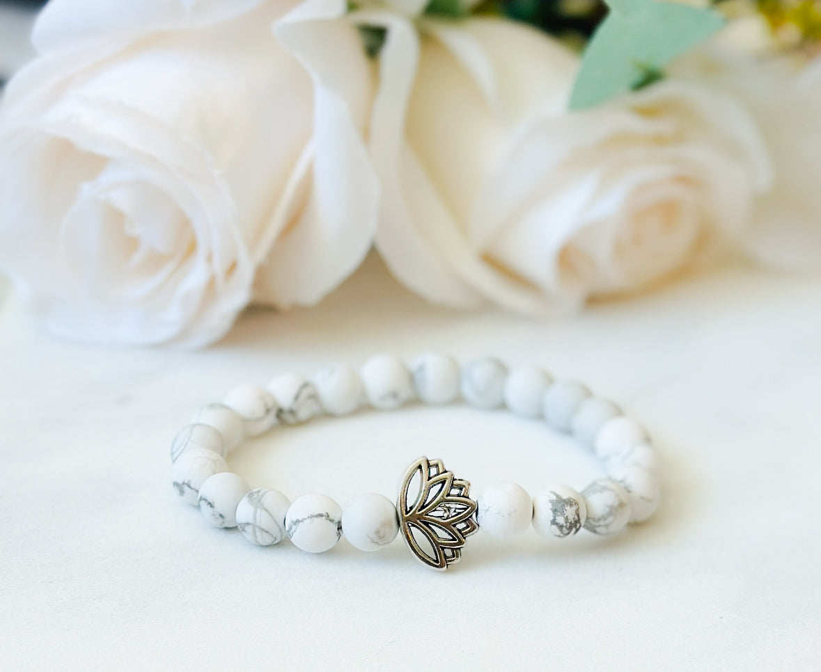 Howlite gemstone bracelet with a lotus bead