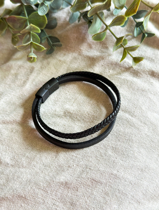 Introducing the Nomad Leather Bracelet – a statement piece for the modern man who values style and adventure. This double-strand leather bracelet combines durability and sophistication, making it the perfect accessory for any occasion. **Leather**: Premium leather chosen for its durability and refined texture.