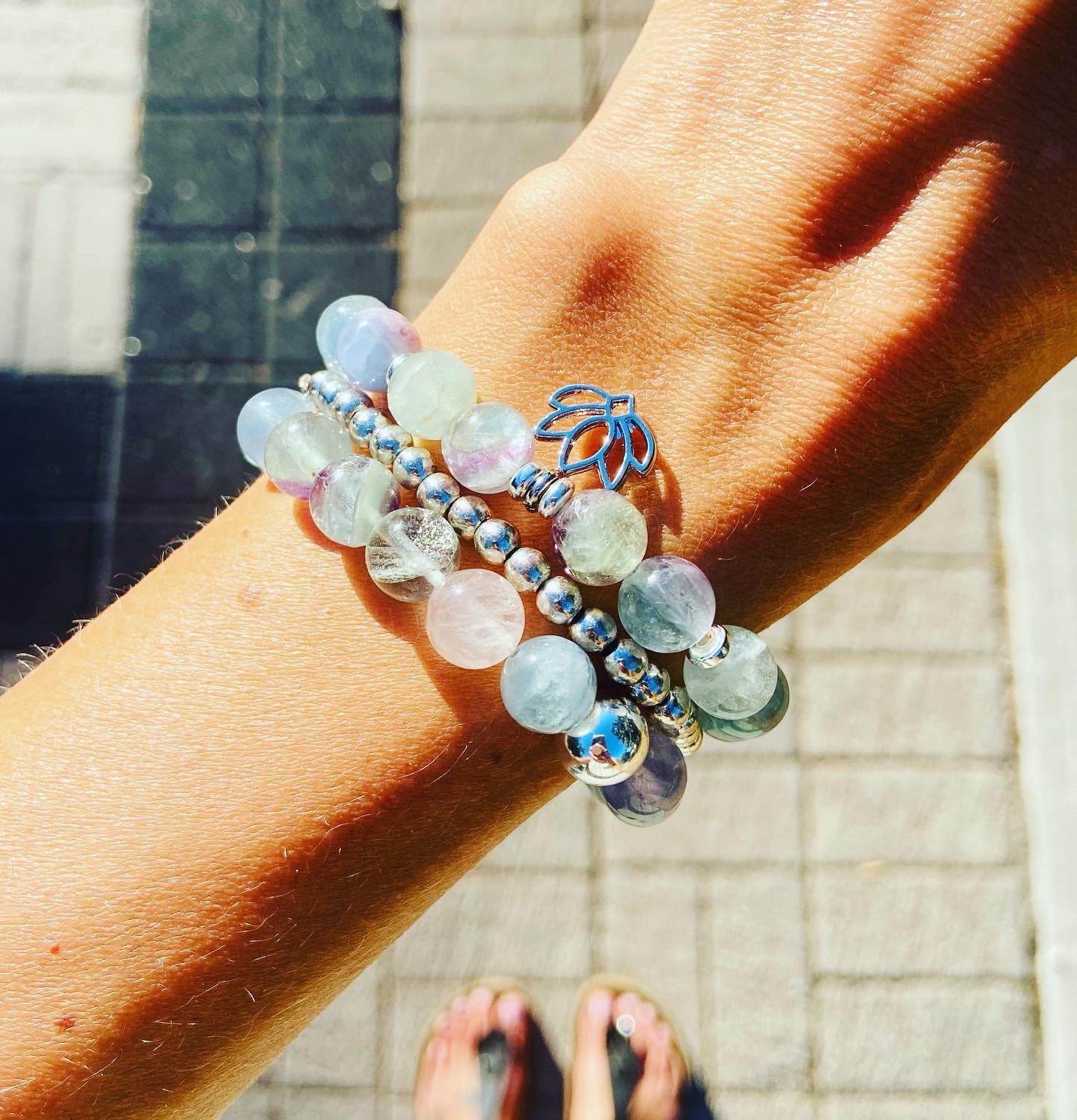 Fluorite gemstone bracelet with a lotus charm