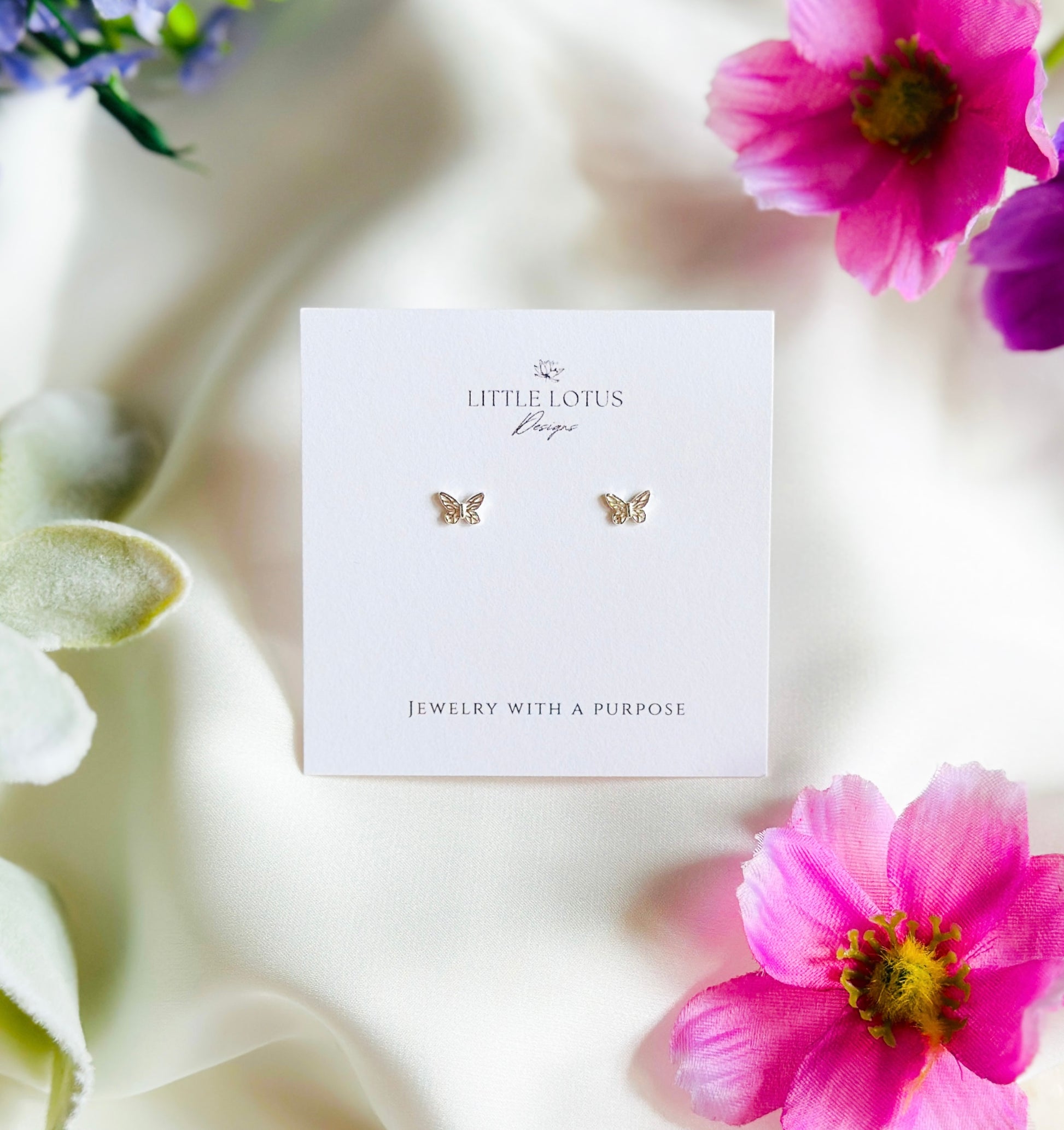 Introducing the **Butterfly Radiance Earrings**, crafted from sterling silver. These earrings carry a profound spiritual symbolism, drawing inspiration from the transformative journey of the butterfly. As the butterfly transitions from a caterpillar to a magnificent creature, it represents growth, renewal, and spiritual evolution.