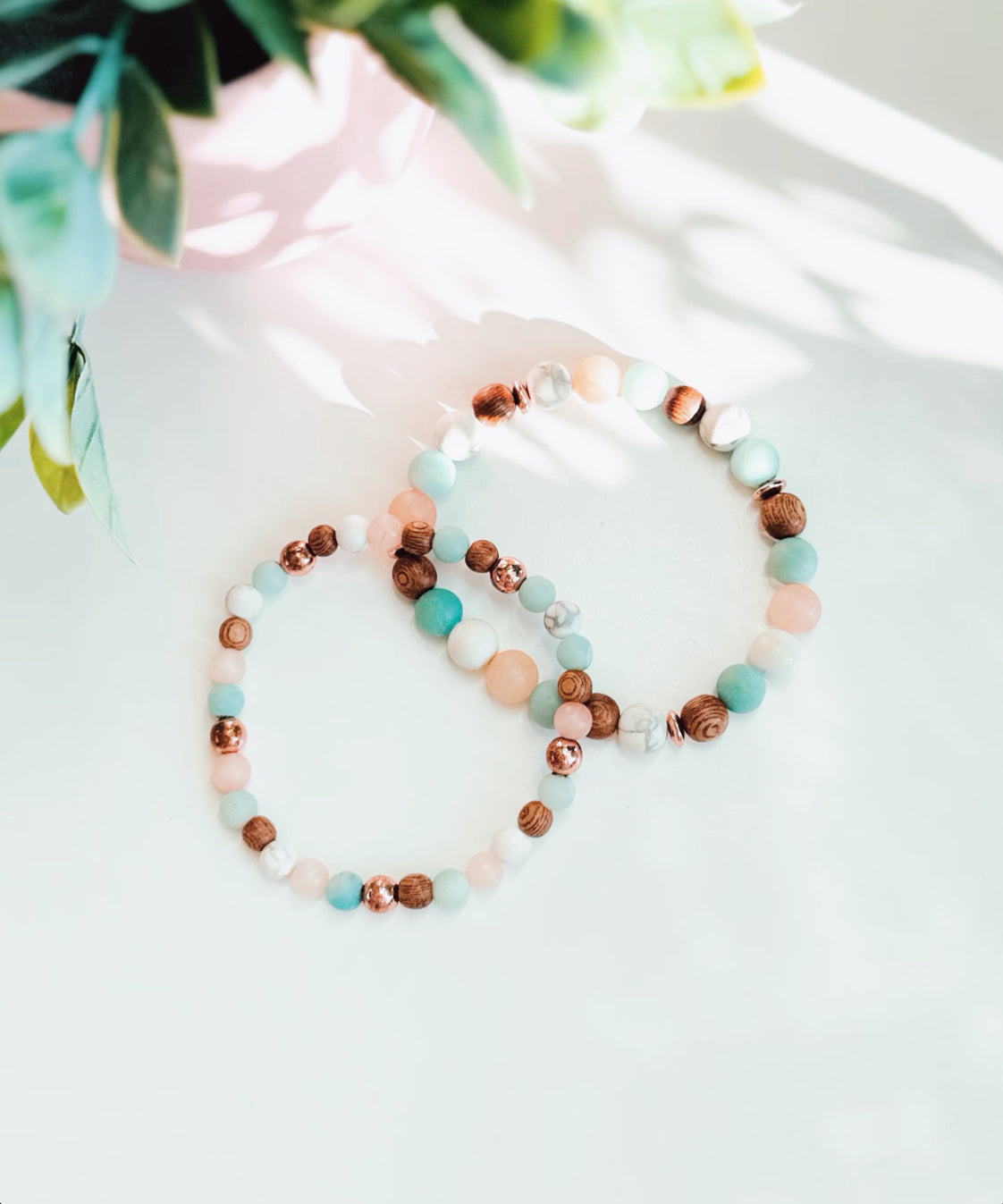 "The Energy Lifting Set," a meticulously crafted collection of gemstone bracelets designed to elevate your energy and promote well-being. This set features a harmonious blend of matte Sunstone, Amazonite, Howlite, and Rosewood, each selected for its unique healing properties.