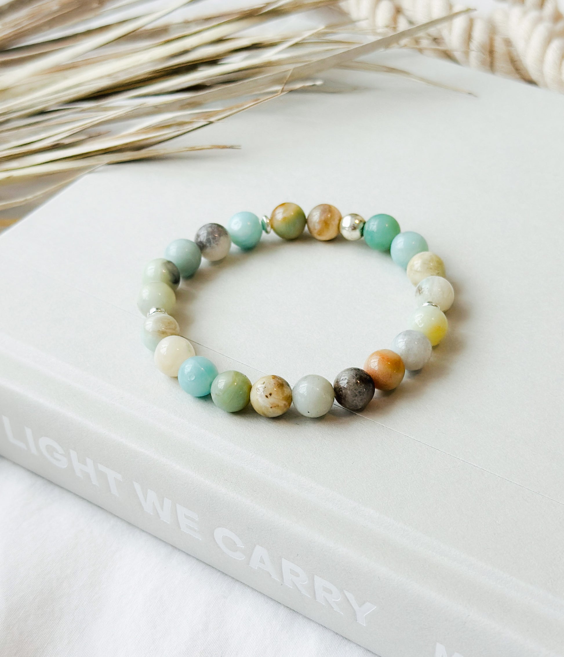 The "Serene Jungle" bracelet, a masterfully crafted piece adorned with Amazonite gemstones, renowned for their healing properties.