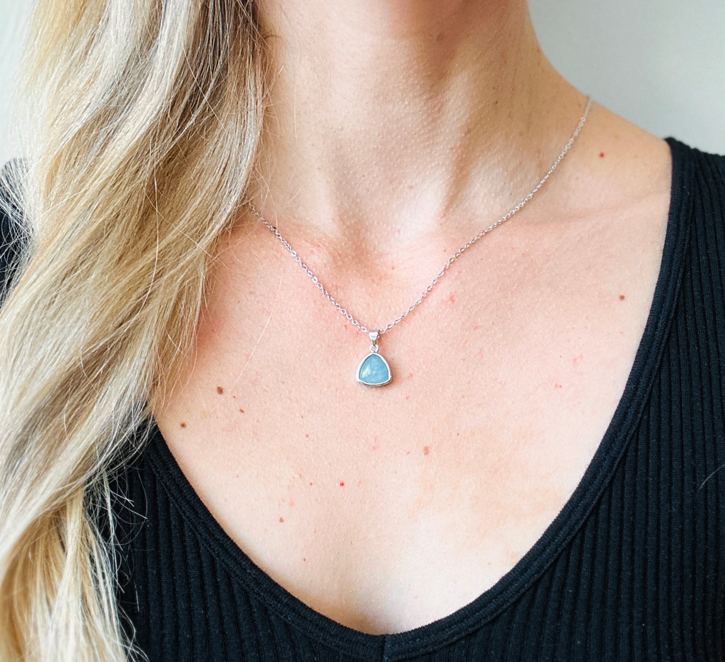 sterling silver necklace adorned with a stunning Aquamarine charm