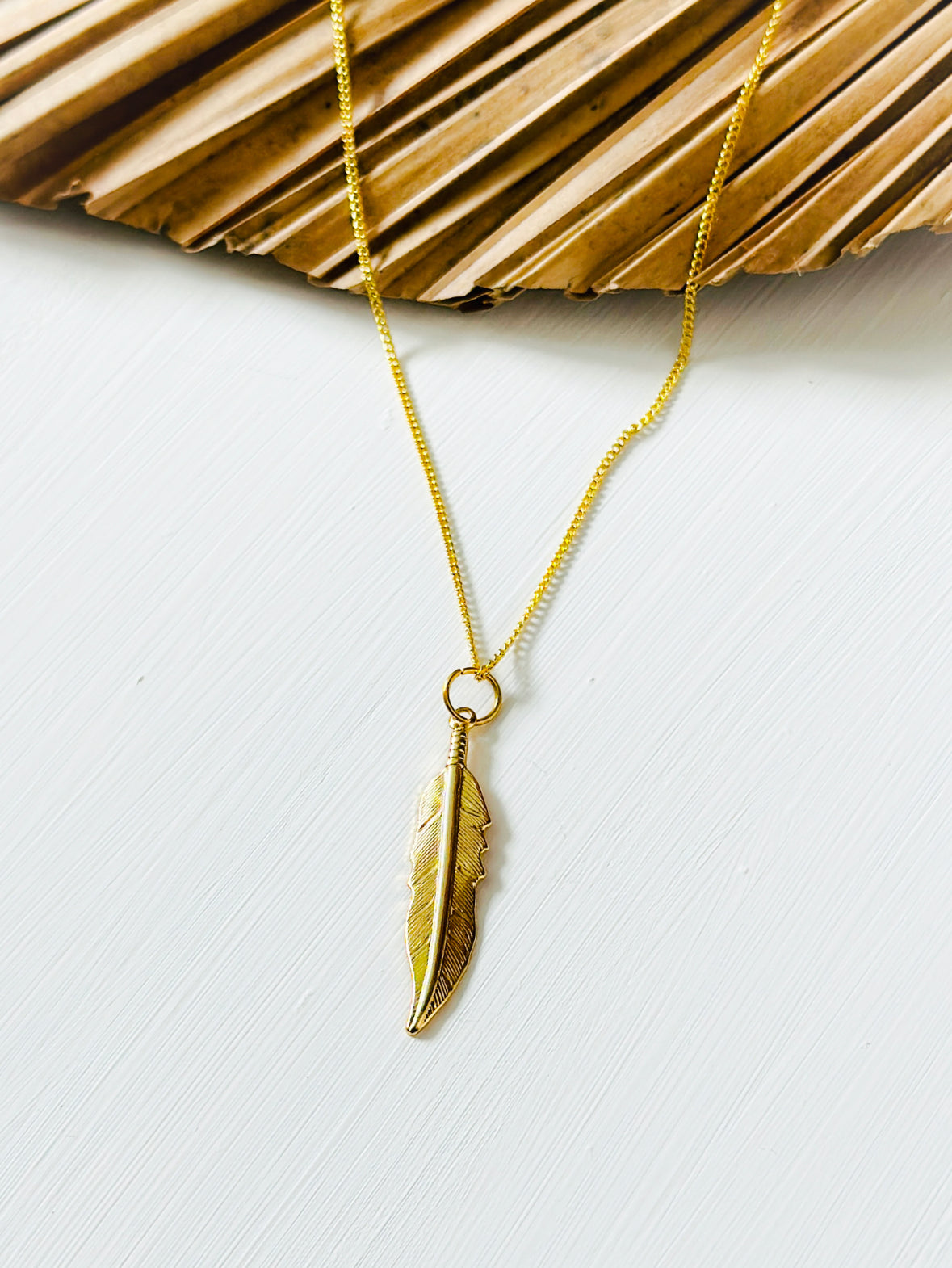 The Gold Feather Necklace