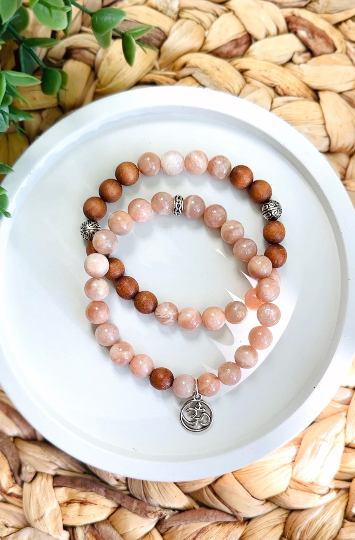Gemstone bracelets Sunstone to bring joy and vitality.
Sandalwood for grounding and calming energy.
The Om charm represents spiritual harmony.
Together they create a set promoting positivity, relaxation, and spiritual balance.