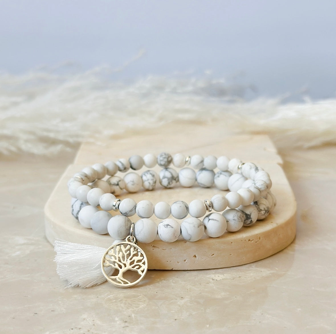 "Howlite" Gemstone Bracelet Set, meticulously crafted with Howlite, chosen for its profound healing properties. Howlite is a stone known to inspire a sense of calm, inner wisdom, and tranquility, making it an ideal companion for mindfulness and self-reflection.