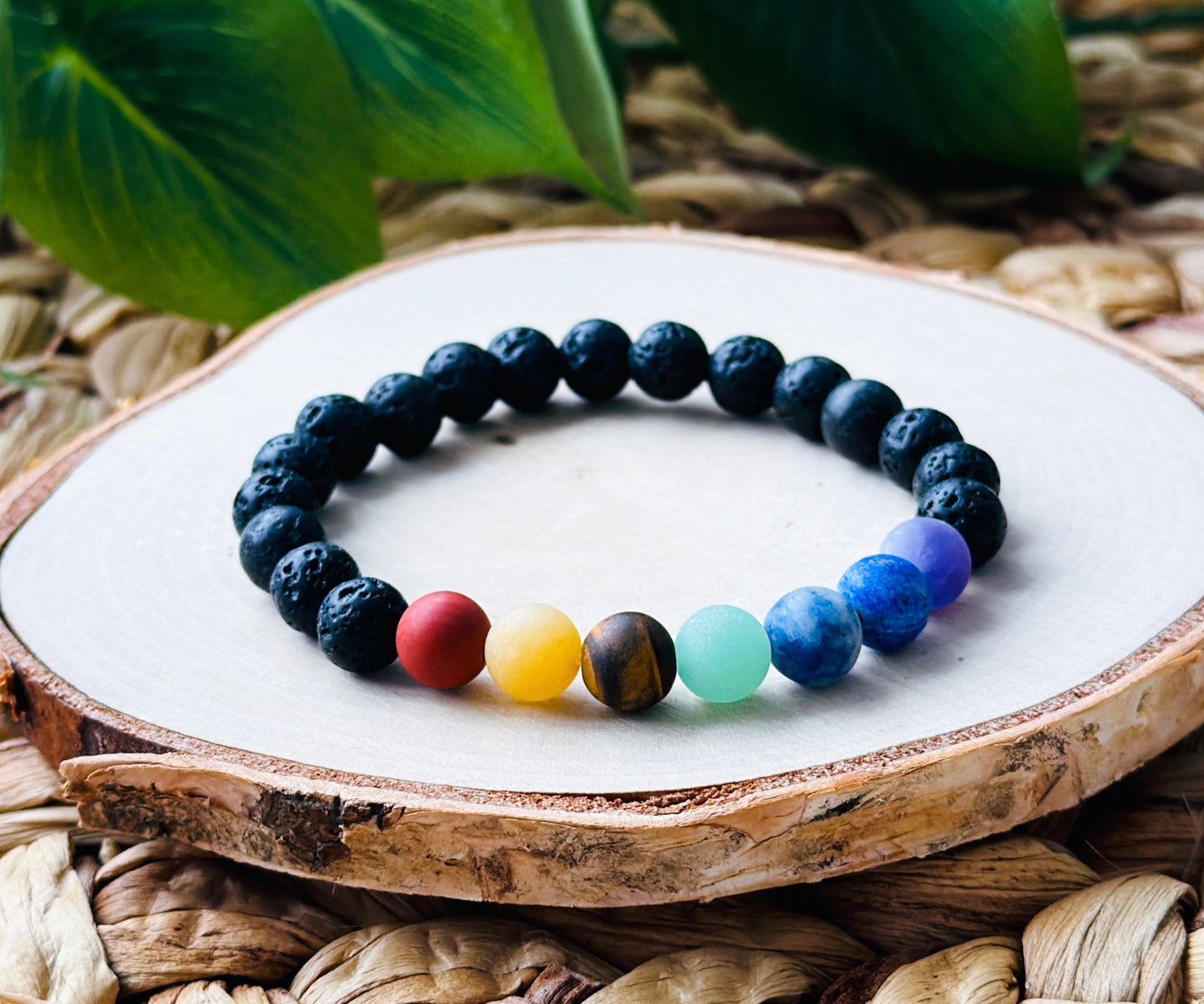 "Elemental Balance Bracelet" — a unique creation blending the grounding energy of lava rock with the harmonizing influence of matte chakra beads.