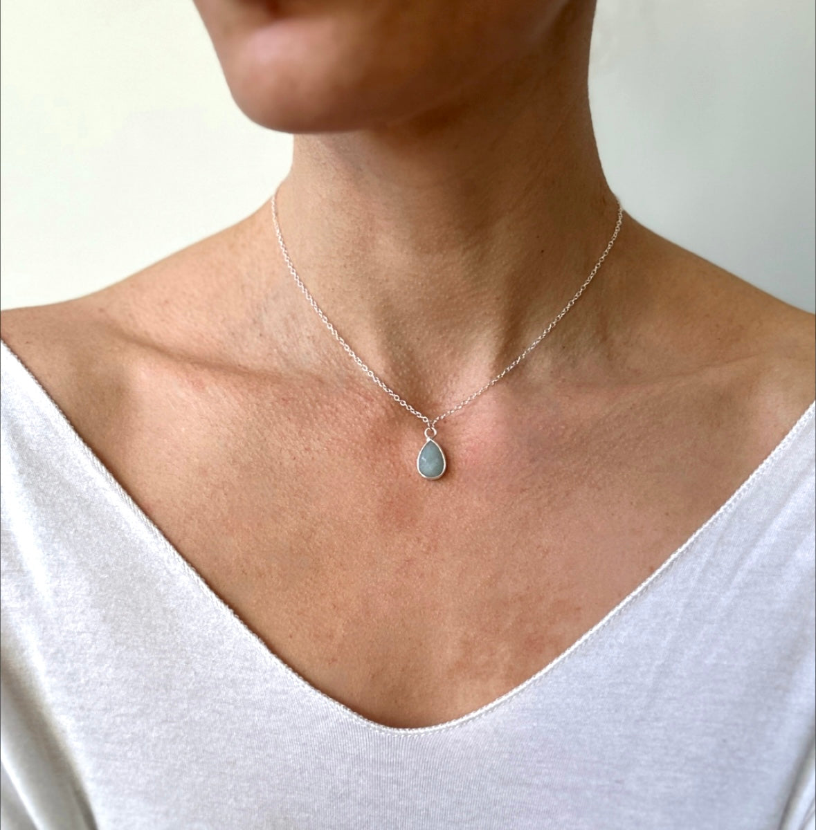 Introducing the Baya Necklace: A sterling silver pendant necklace adorned with a captivating Aquamarine gemstone.