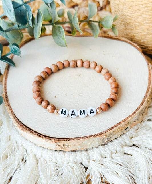 Introducing the Natural Mama Bracelet, a harmonious blend of 6mm Rosewood and Hematite beads, thoughtfully designed to embody both style and holistic healing. 
