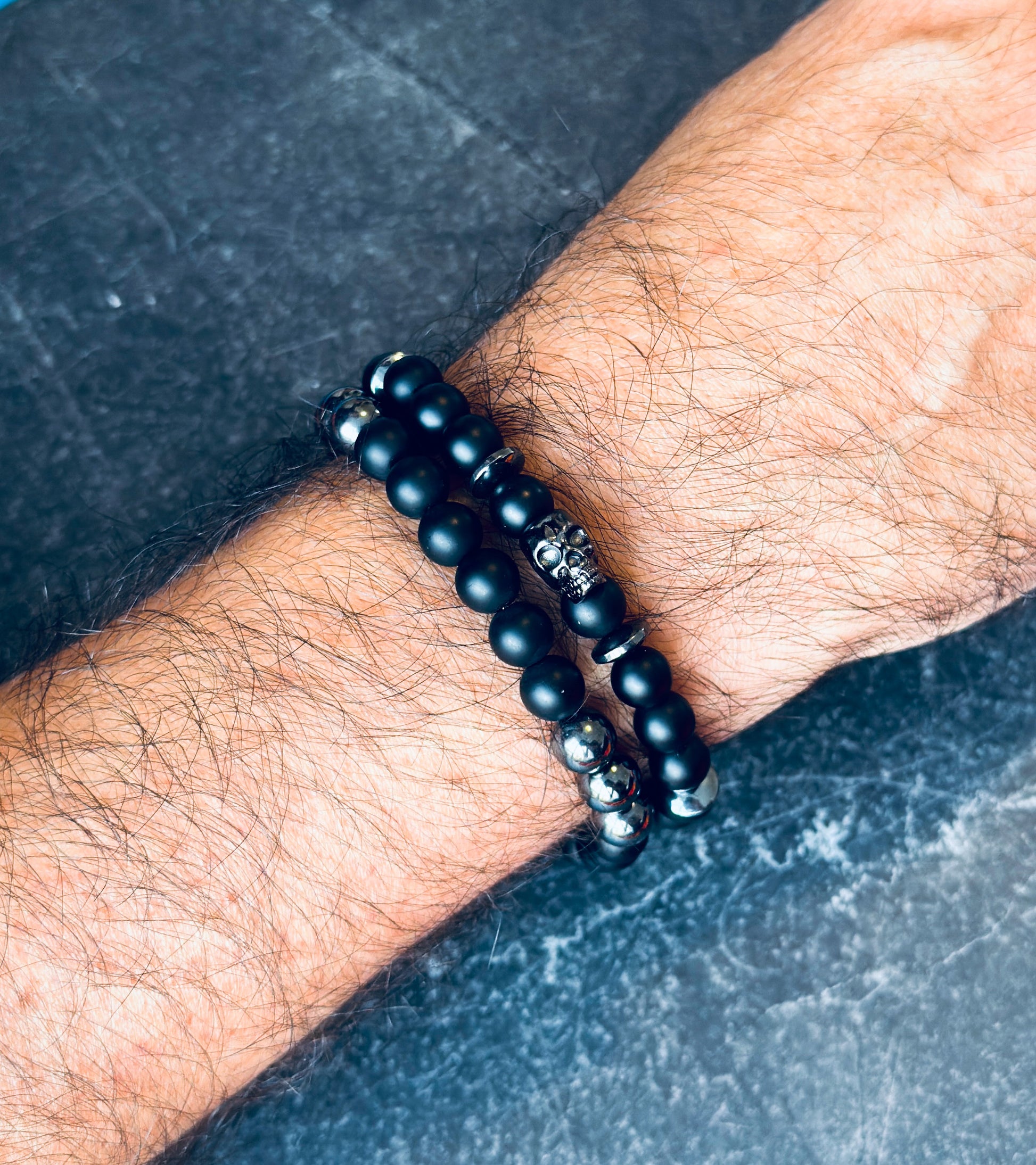mens gemstone bracelets made with Matte Onyx, Hematite and a skull bead 