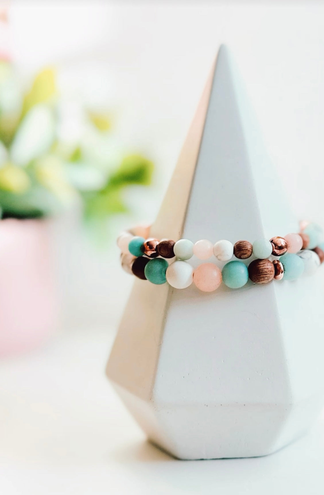 "The Energy Lifting Set," a meticulously crafted collection of gemstone bracelets designed to elevate your energy and promote well-being. This set features a harmonious blend of matte Sunstone, Amazonite, Howlite, and Rosewood, each selected for its unique healing properties.
