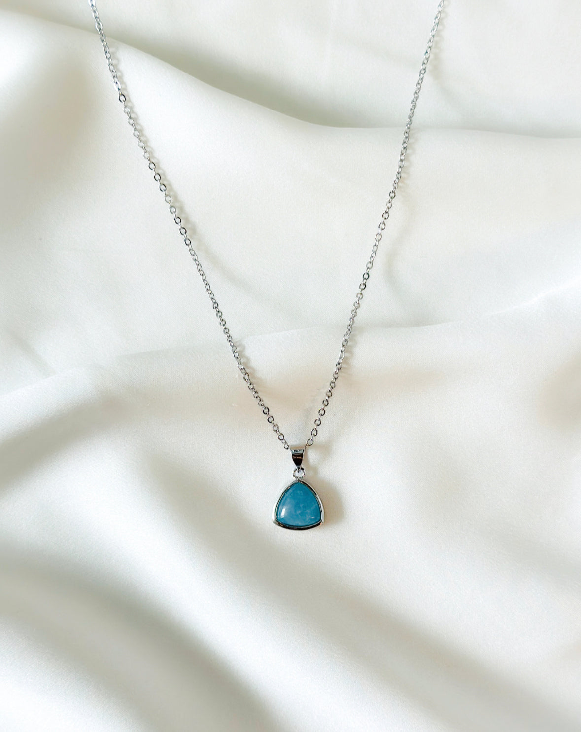 sterling silver necklace adorned with a stunning Aquamarine charm
