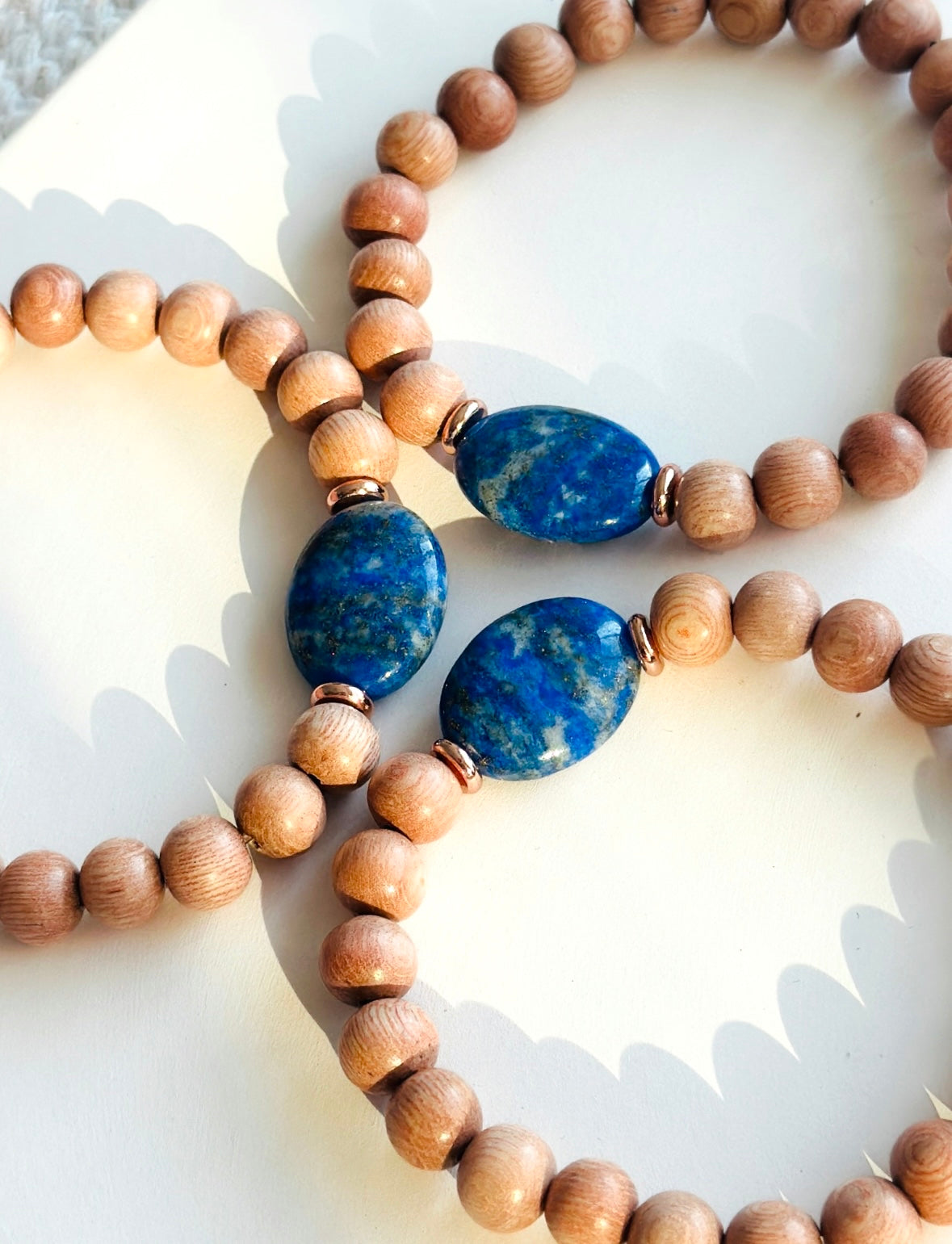 rosewood bracelet with a Lapis Lazuli focal bead