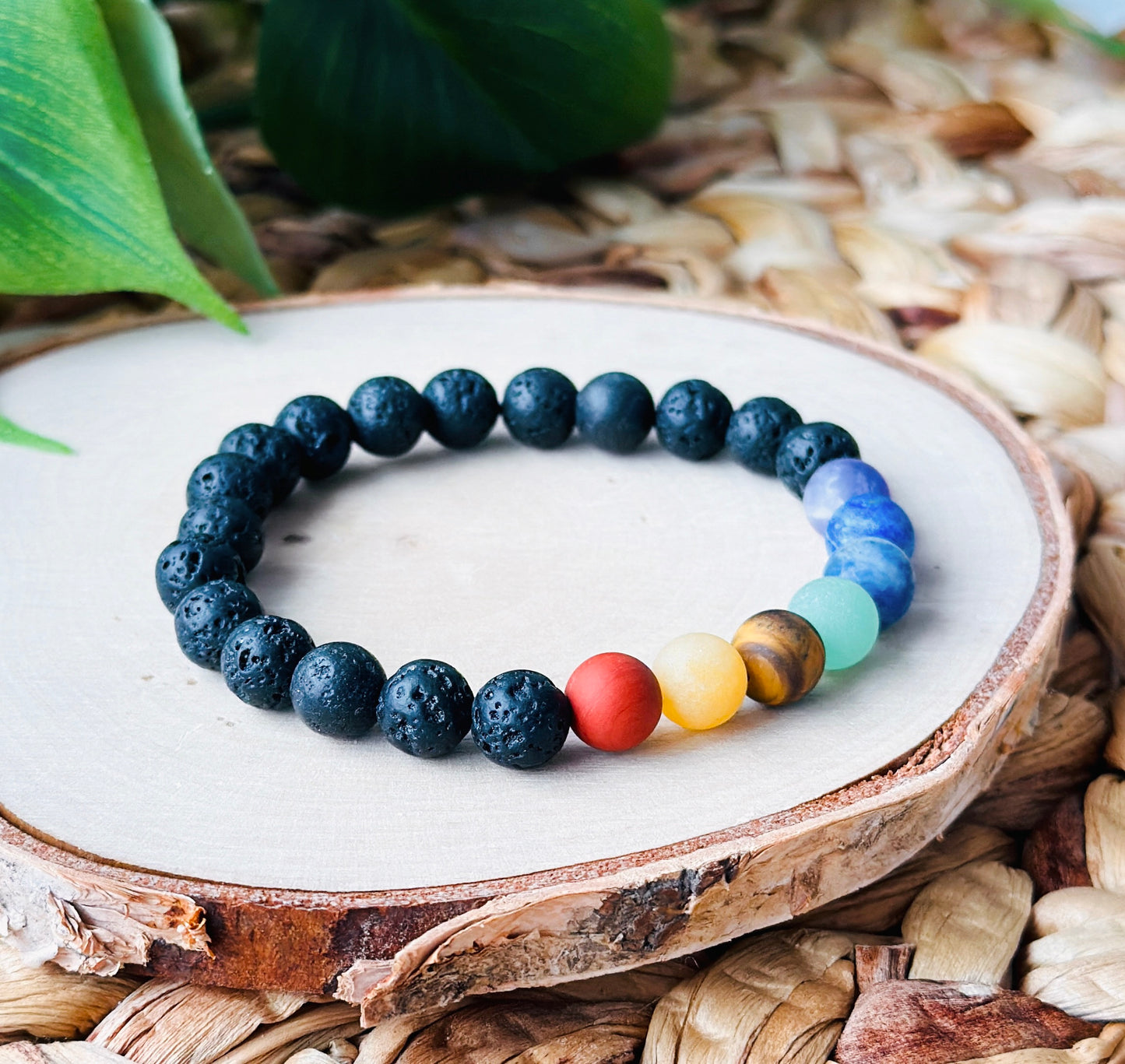 "Elemental Balance Bracelet" — a unique creation blending the grounding energy of lava rock with the harmonizing influence of matte chakra beads.