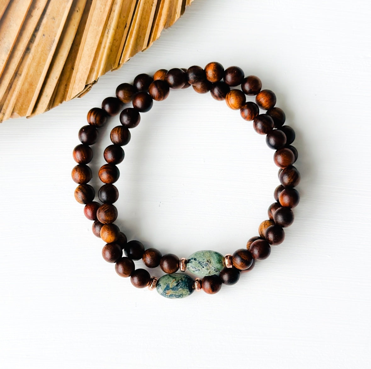 The Serene Forest" gemstone bracelet, a harmonious blend of Kambaba Jasper and the grounding essence of Sandalwood.  