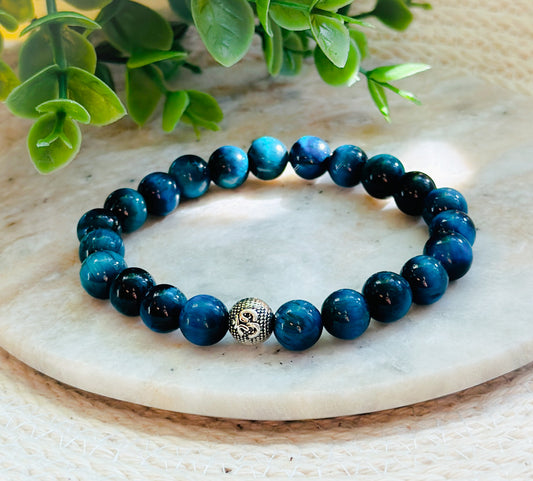 gemstone bracelet crafted with the enchanting Blue Tiger's Eye and a sacred OM bead