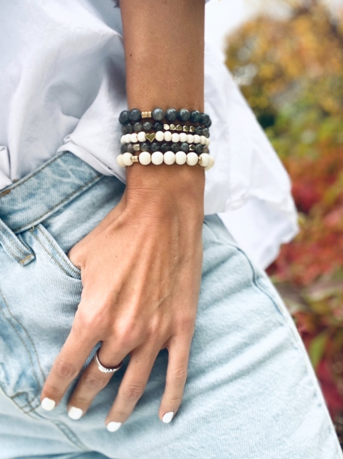 This healing gemstone bracelet stack is crafted with natural Labradorite and Whitewood beads.   Labradorite is known for its powerful energy that helps to balance and protect the aura, and is used to enhance intuition, psychic abilities, and spiritual growth.