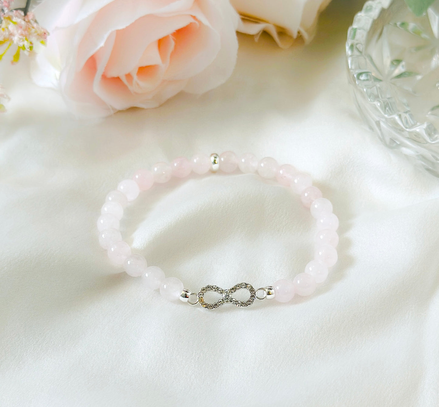 Rose Quartz bracelet with silver infinity symboll