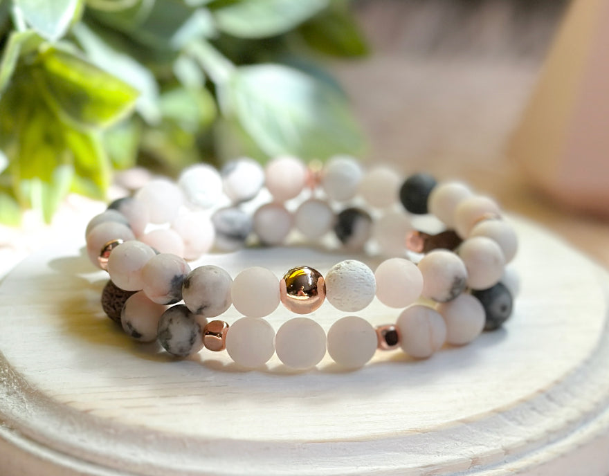 beautiful gemstone bracelet set features Pink Zebra Jasper and Mauve and White Lava Rock beads and Matte Rose Quartz.